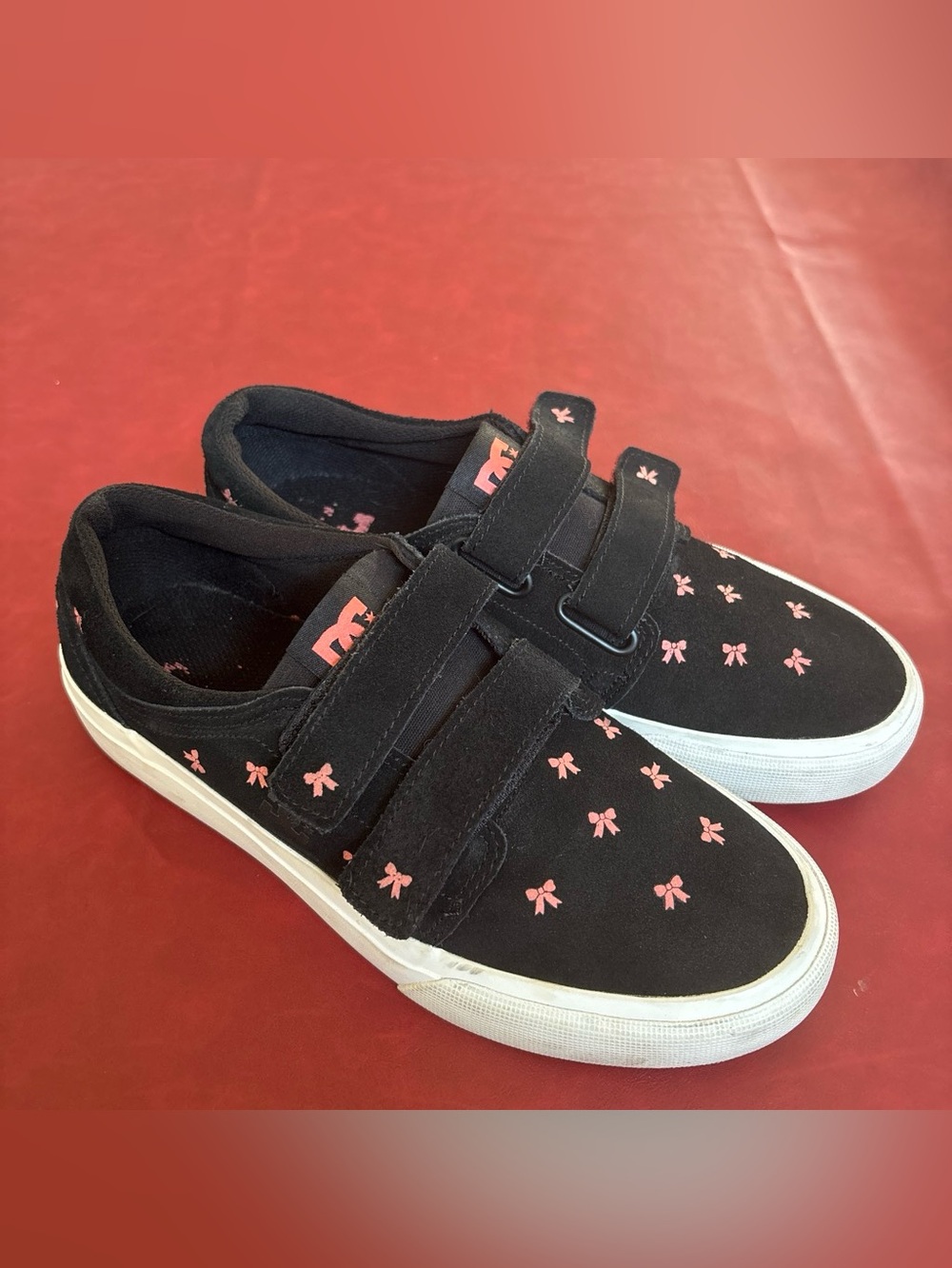 DC Kids Black Sneakers with Pink Bow Accents